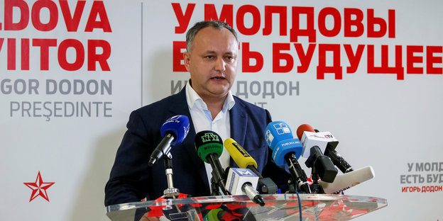 Moldova's Socialist Party presidential candidate Igor Dodon speaks to the media after a presidential election at his election headquarters in Chisinau
